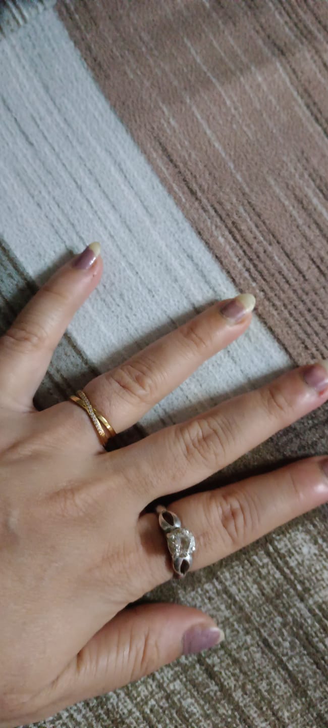 Customer photo review of Cross-Over Stones Lined Twist Ring