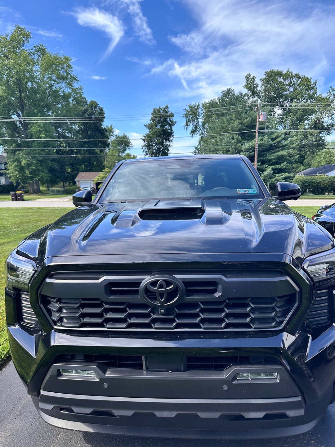 Customer photo review of NEW 2024-2026 Tacoma Matte Blackout Overlay Front Grille Emblem