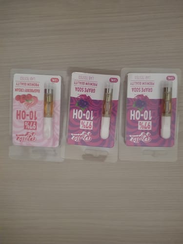 Customer's three 10-OH Cartridge 1ml units in original packaging, showing one Raspberry Cream and two Grape Soda flavors.