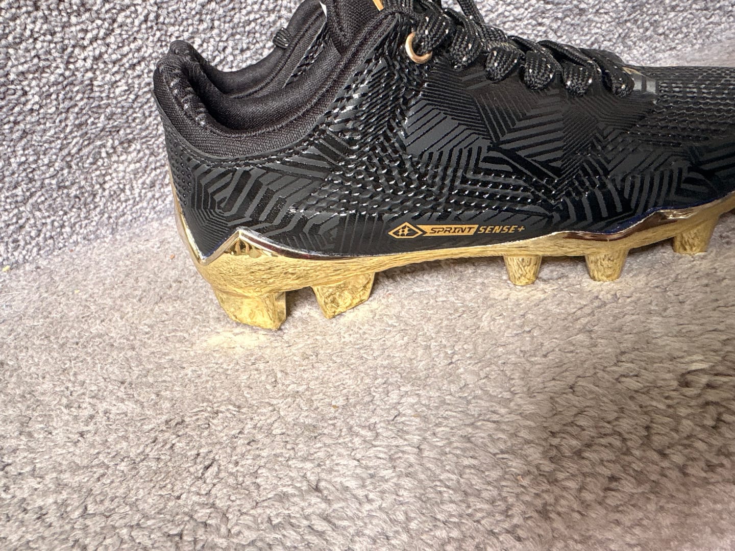 Customer photo review of Phenom Elite Quantum Carbon Football Cleats – Gold Rush (Black & Gold)