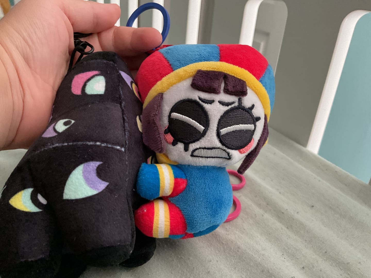 Customer photo review of Pomni & Abstraction Magnetic Plush Keychains