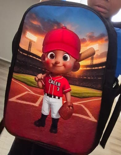 Customer's personalized baseball backpack showing a cartoon boy character in a uniform on a baseball field.