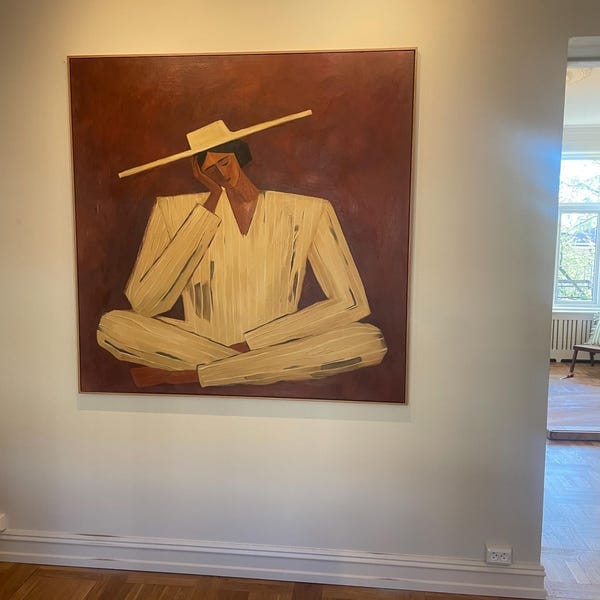 Customer photo review of Still — Seated Figure in Wide Hat Canvas Wall Art, Ochre & Oxblood
