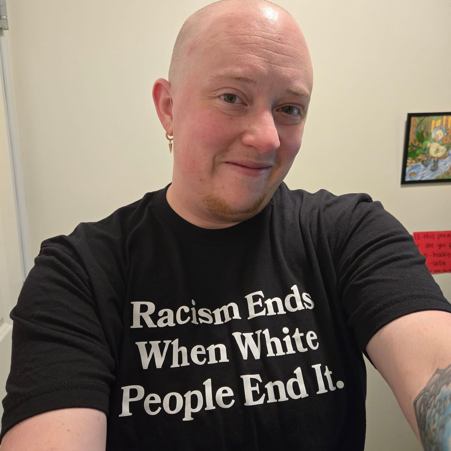 Customer photo review of Racism Ends Unisex T-Shirt