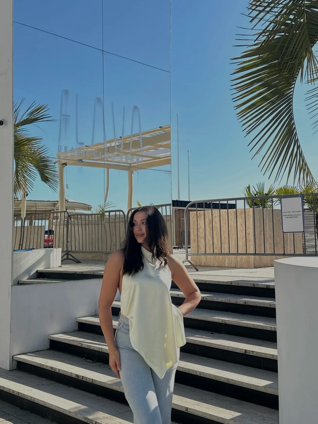 Customer photo review of Elina Halter Pleated Sleeveless Top