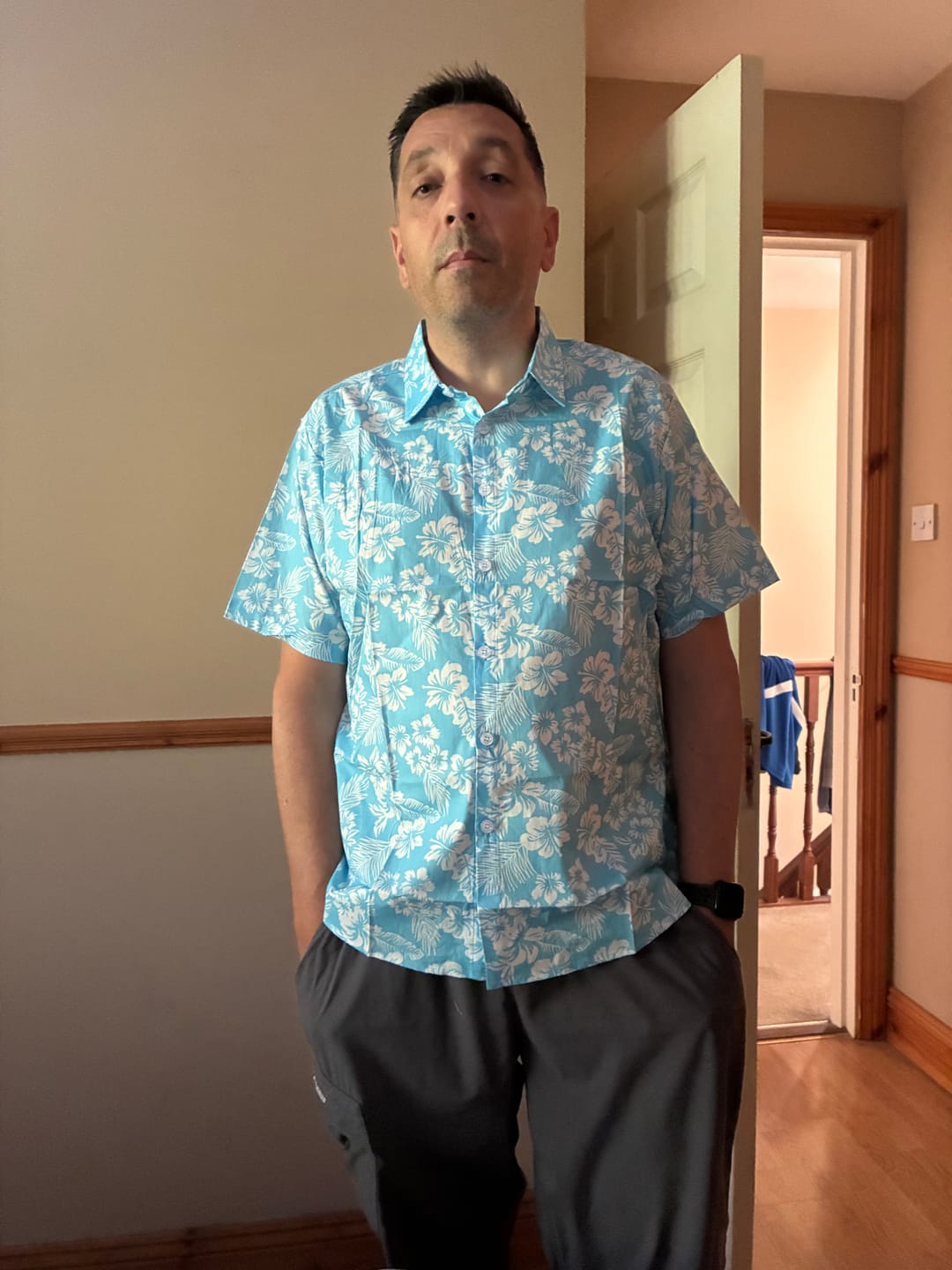 Customer photo review of Men's Holiday Blue Hawaiian Floral Button Up Short Sleeve Shirt