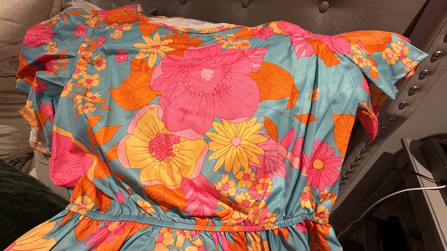 Customer photo review of Women's 2026 Summer Casual Floral Print Short Flutter Sleeve Flowy Maxi Dress