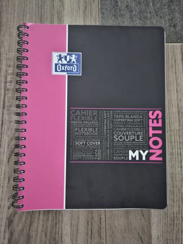 Customer's pink and black Oxford MyNOTES spiral notebook, seen from the front cover.