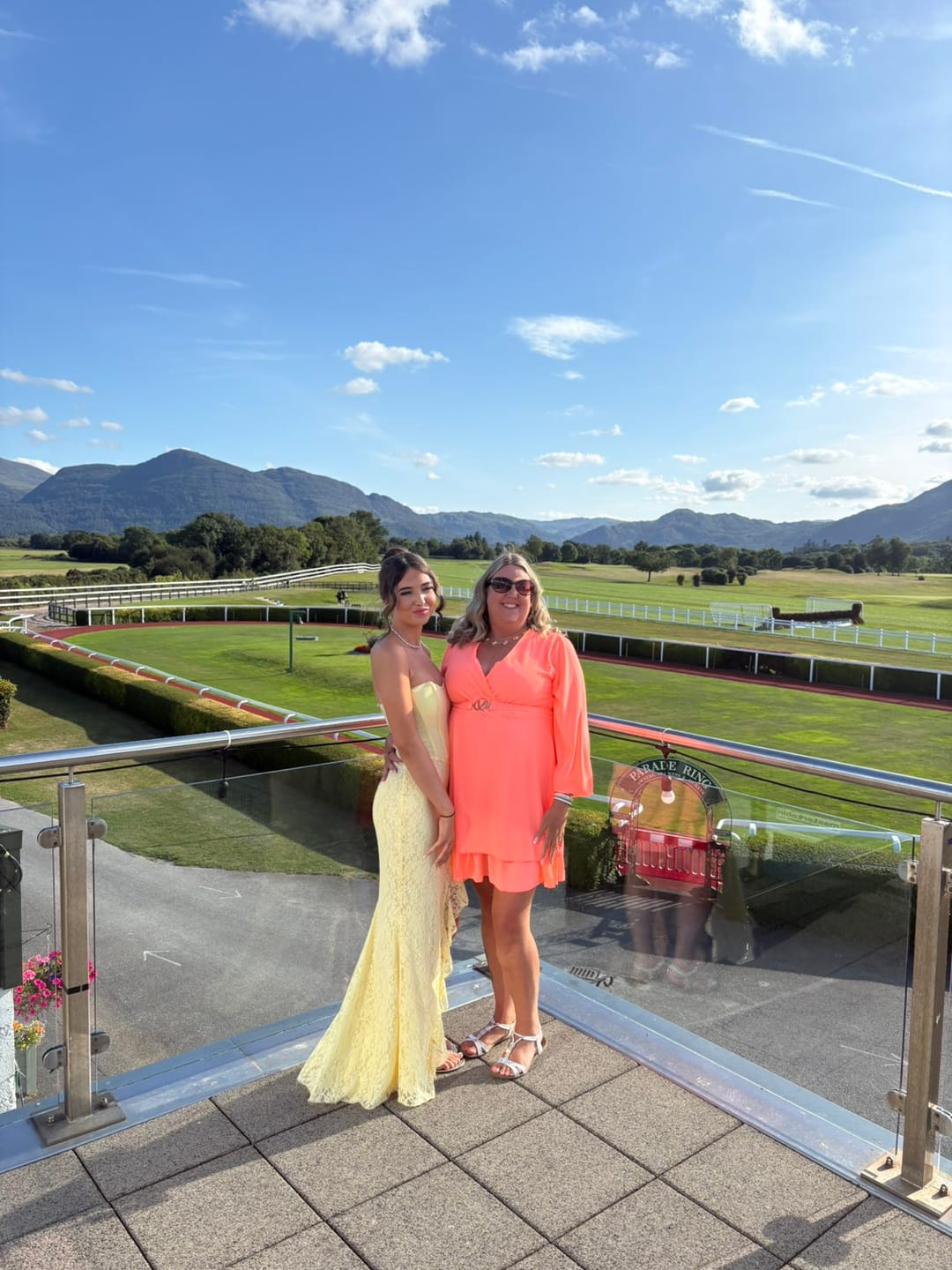 Customer photo review of Marlowe Coral Wrap Mini Dress