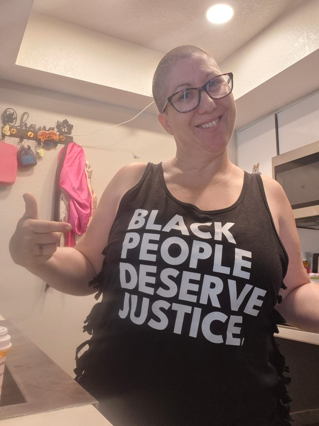 Customer photo review of Black People Deserve Justice Unisex Tank Top