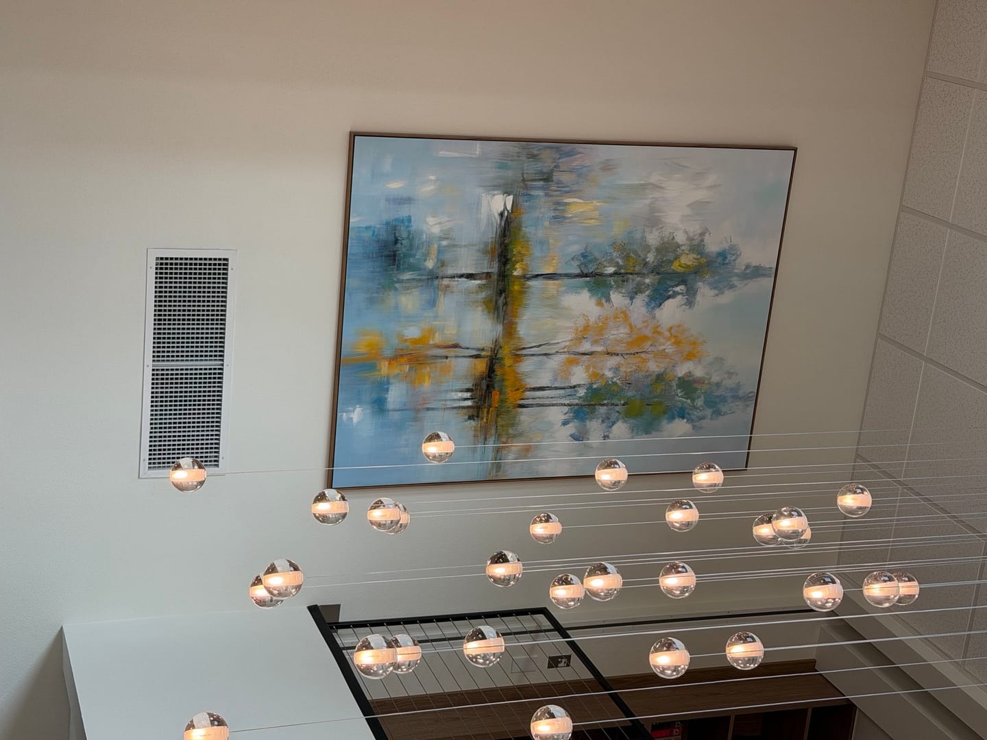 Customer photo review of Whispering Reflections-Modern Abstract Landscape Oil Painting - Tree Reflections in Water, Blue-Gray Tones with Warm Yellow Accents, Serene Nature Wall Art for Living Room & Bedroom Decor