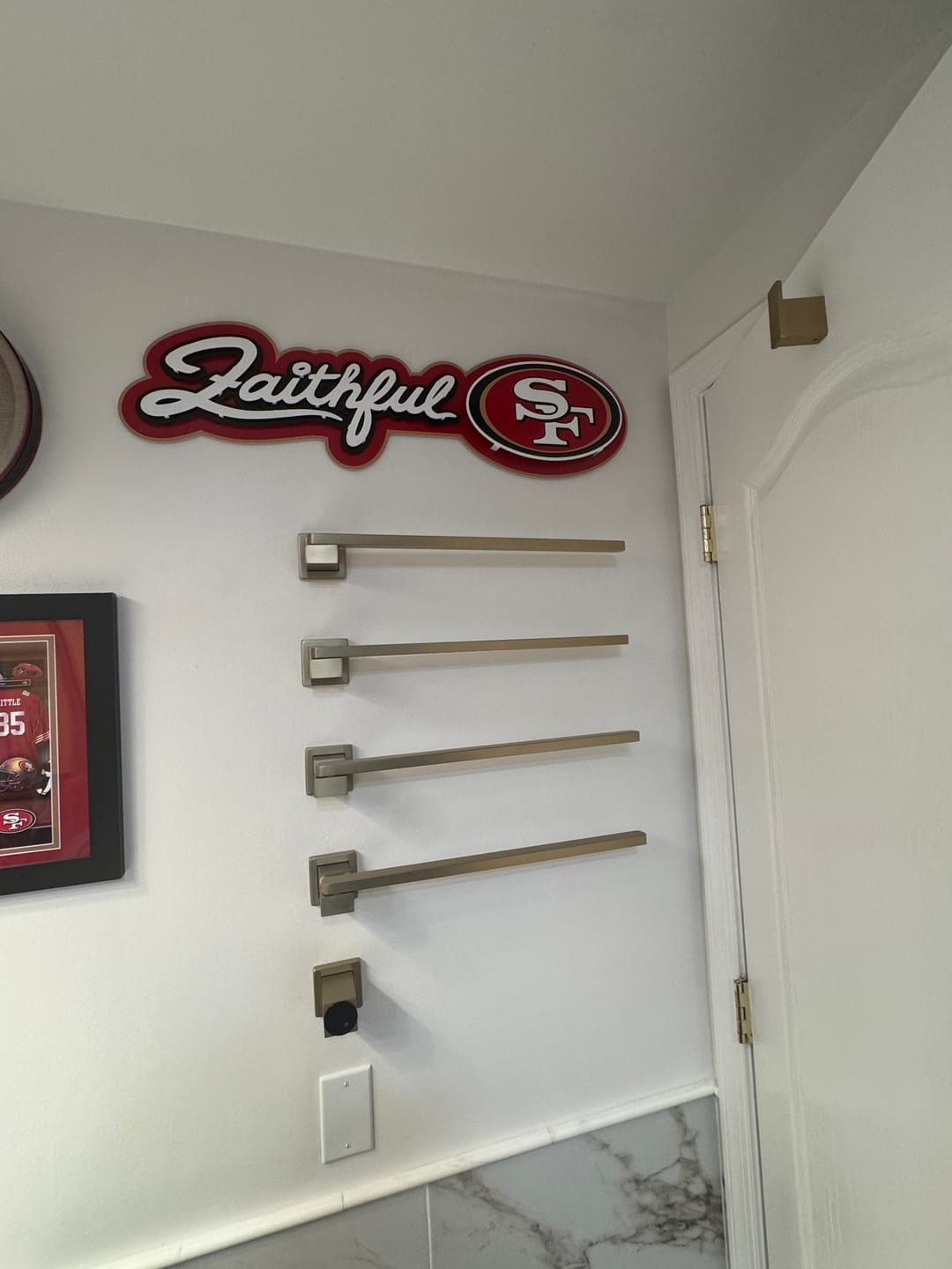 Customer photo review of San Francisco 49ers - Hex Head EXCLUSIVE "Faithful" Wordmark 3D Metal Wall Art
