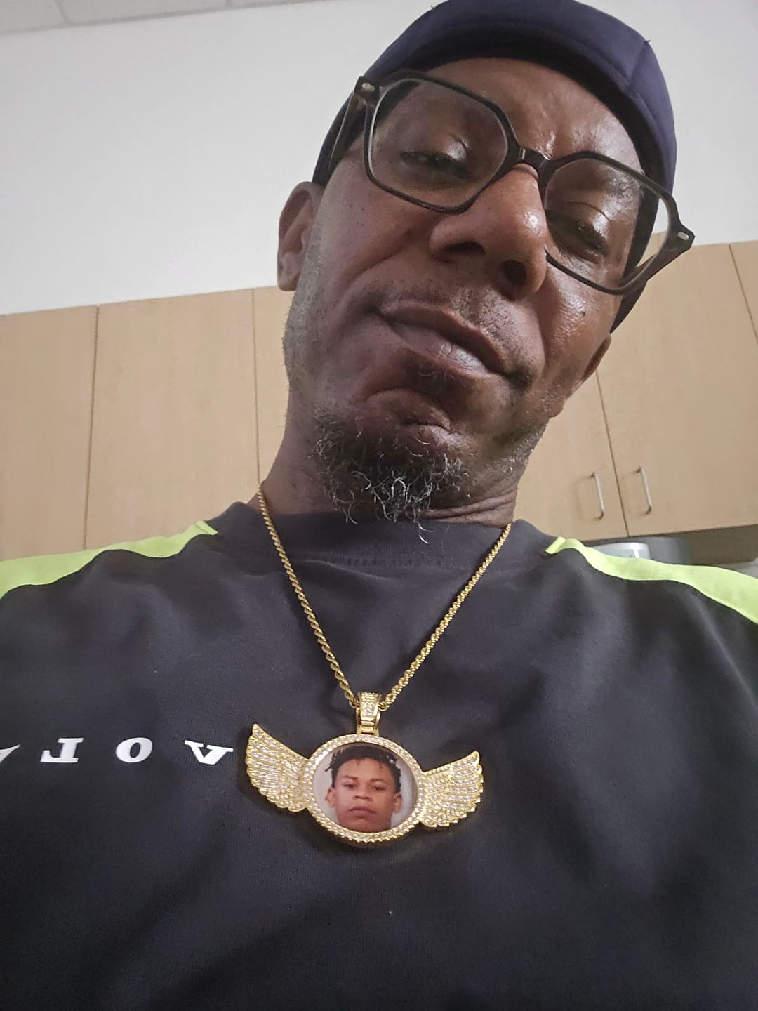 Customer photo review of Diamond Studded Angel Wing Photo Necklace