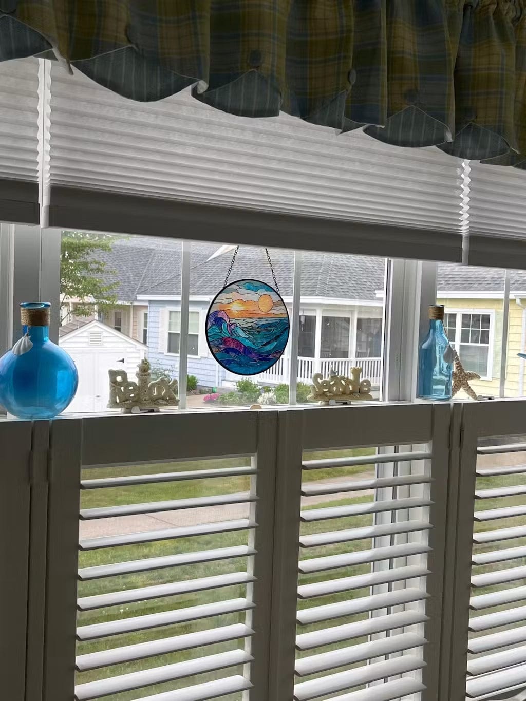 Customer photo review of Stained Glass Suncatcher – Golden Sunburst Mountain Ocean