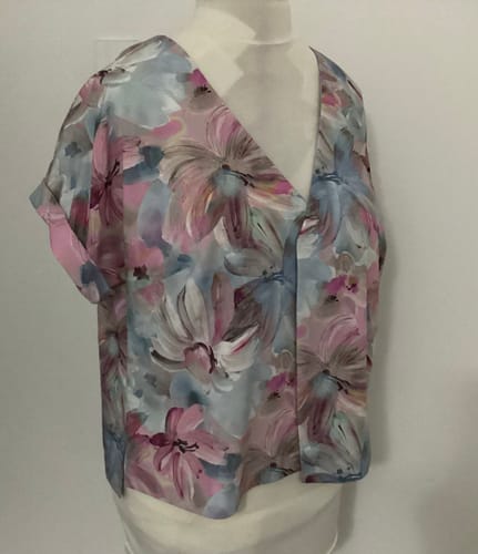 Customer's Ethereal Petals Viscose Fabric sewn into a floral blouse on a mannequin.