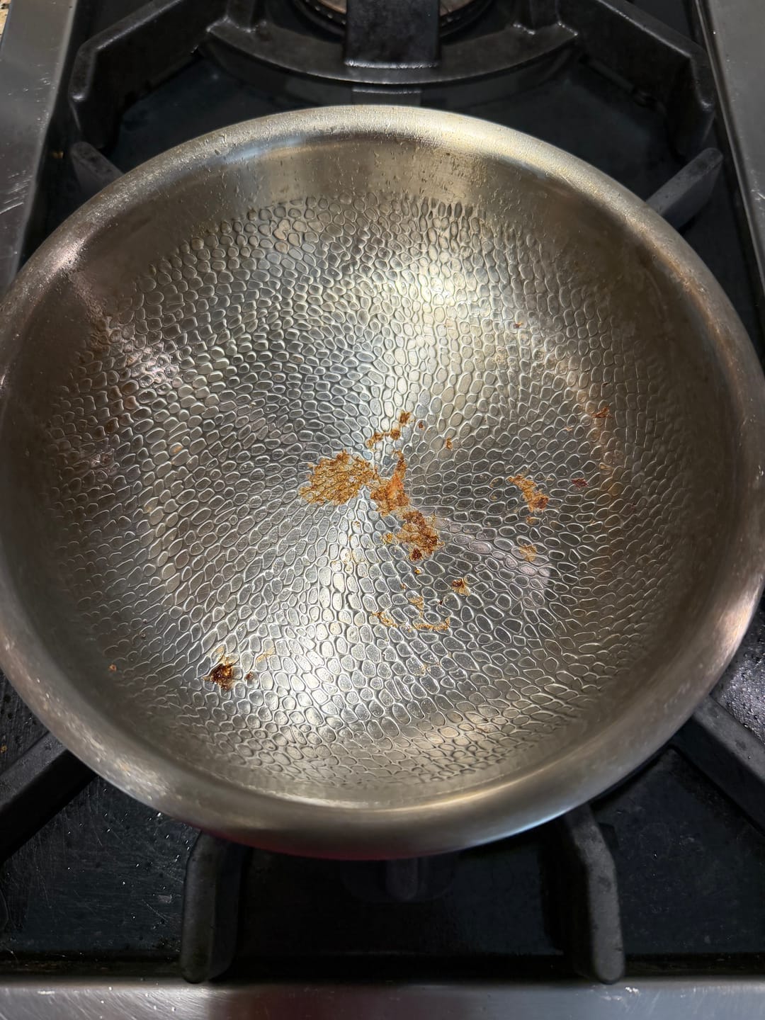 Customer photo review of Hand-Hammered Titanium Wok Pan with Flat Base | Limited Edition