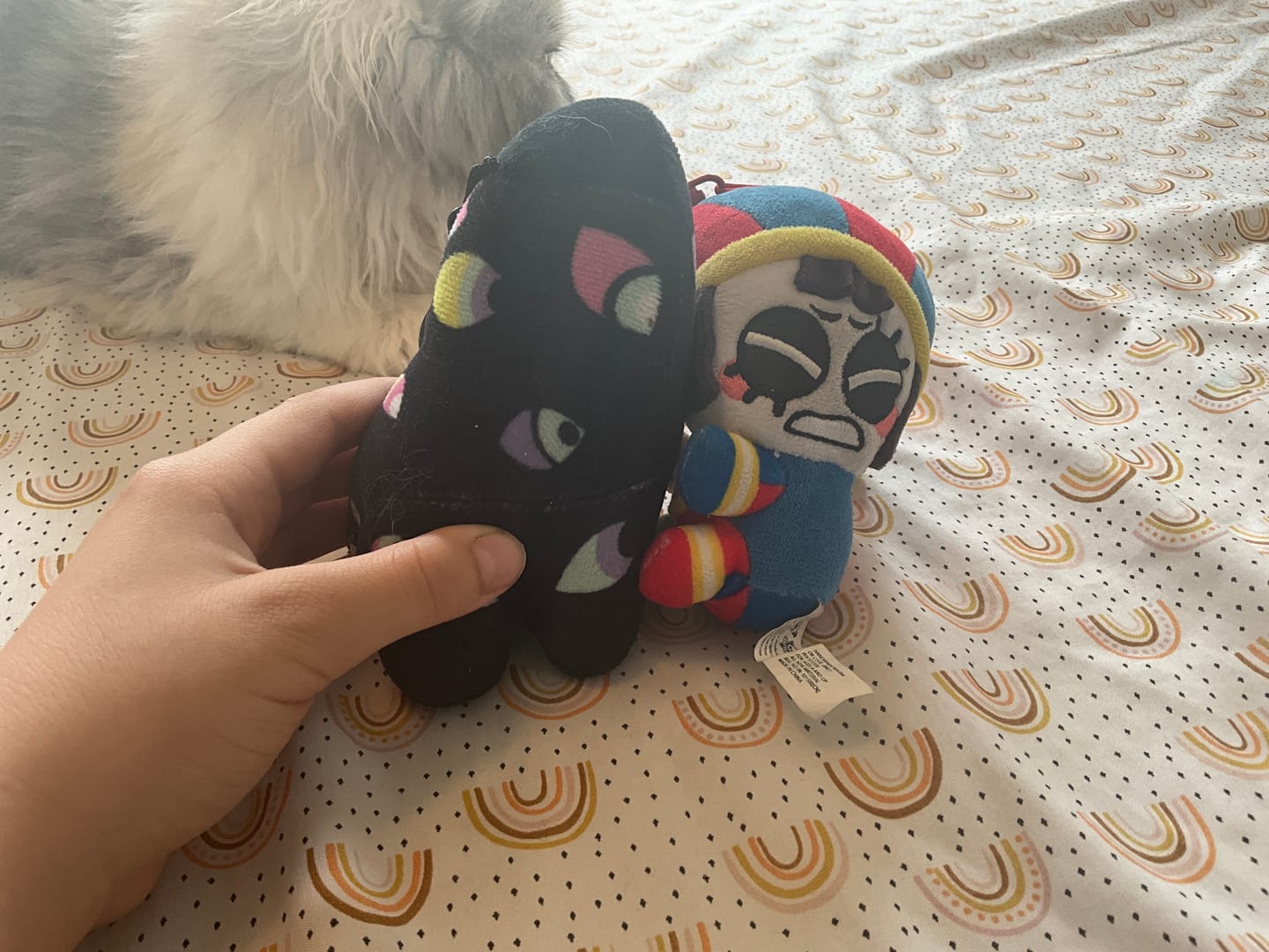 Customer photo review of Pomni & Abstraction Magnetic Plush Keychains
