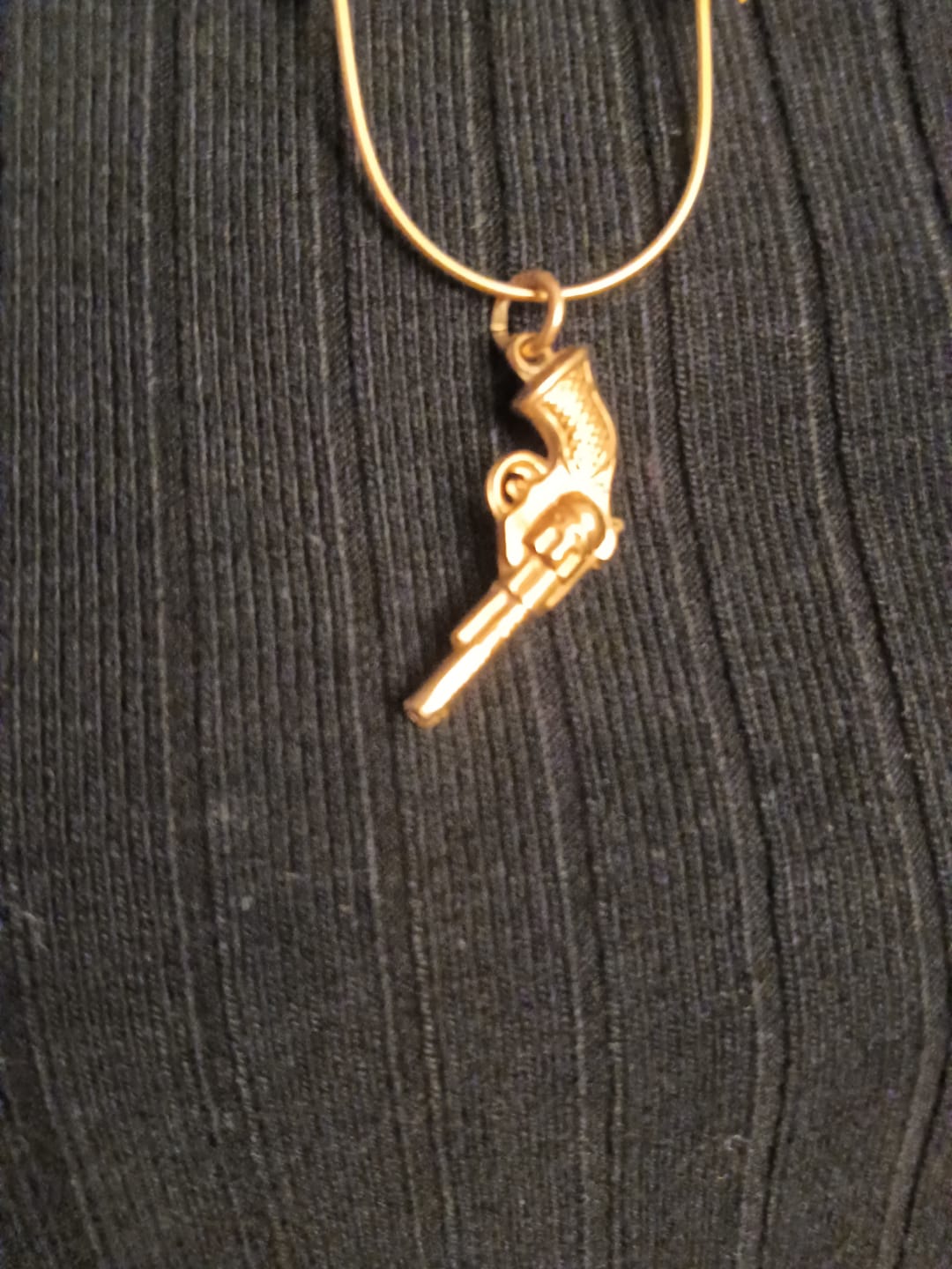 Customer photo review of The Dangerous Golden Revolver Charm (9ct 375 Gold c 1960)