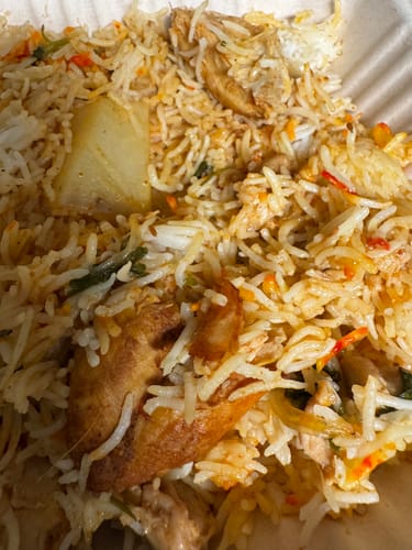 Customer's Halal Chicken Leg & Thigh cooked as chicken biryani with rice and potatoes