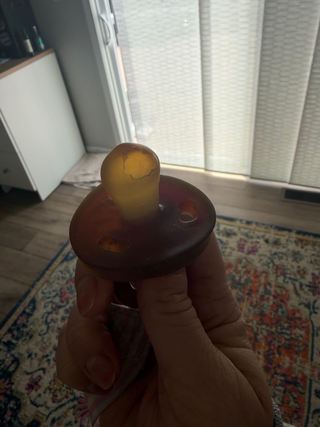 Customer photo review of Pacibamber - a Pacifier made from Natural Rubber Infused with Baltic Amber