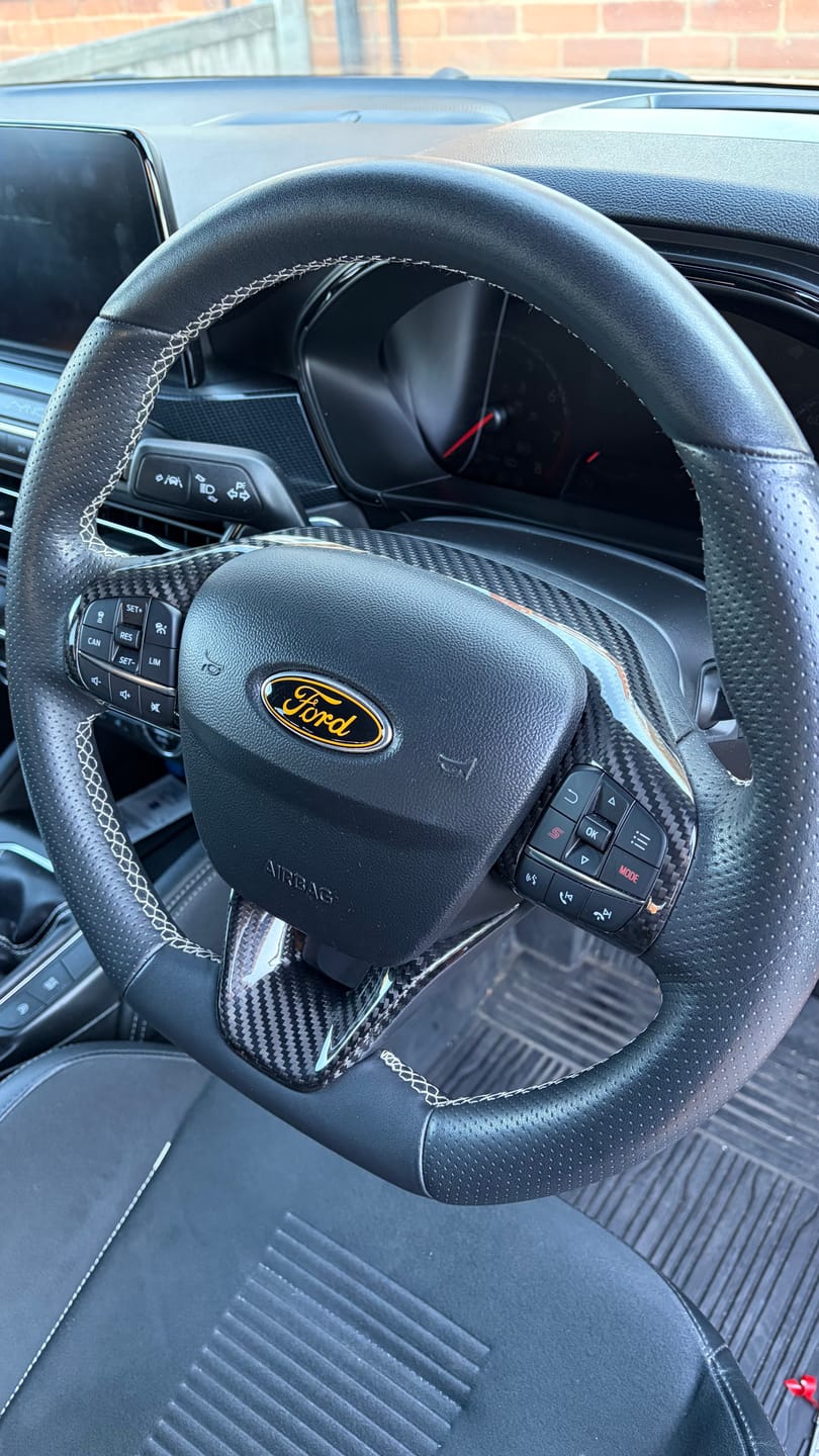 Customer photo review of Mk8/8.5 Fiesta & Mk2 Puma Real Carbon Fibre Upper Steering Wheel Trim