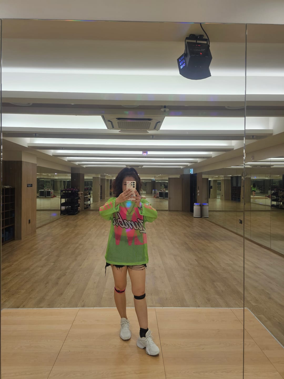 Customer photo review of Dale-Z Oversized Mesh Long Sleeve Top