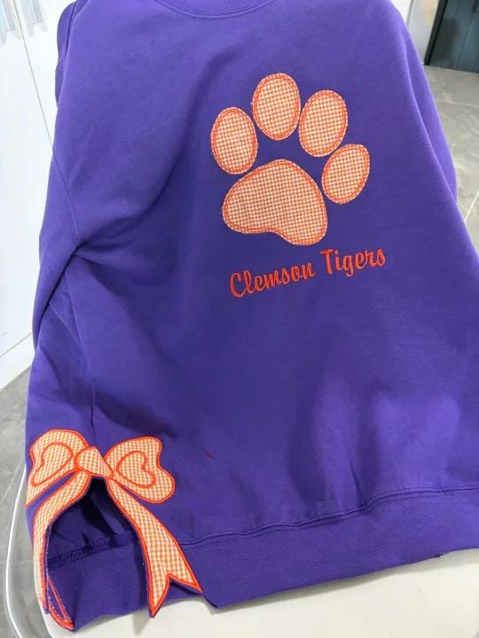 Customer photo review of Custom Tennessee Volunteers Women’s Team Spirit Sweatshirt – Applique Embroidered Side Bow Pullover