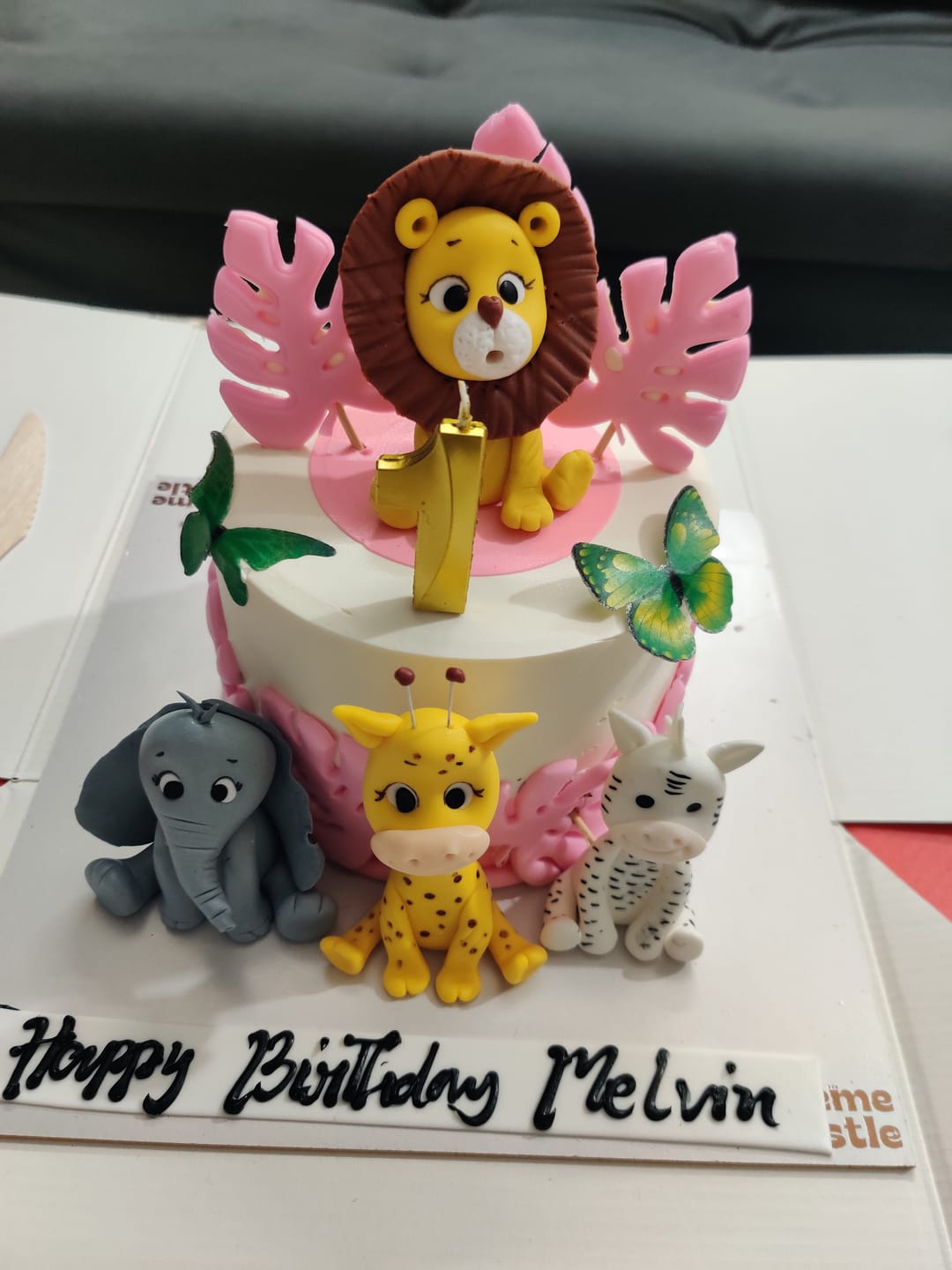 Customer photo review of Jungle theme pink Cake