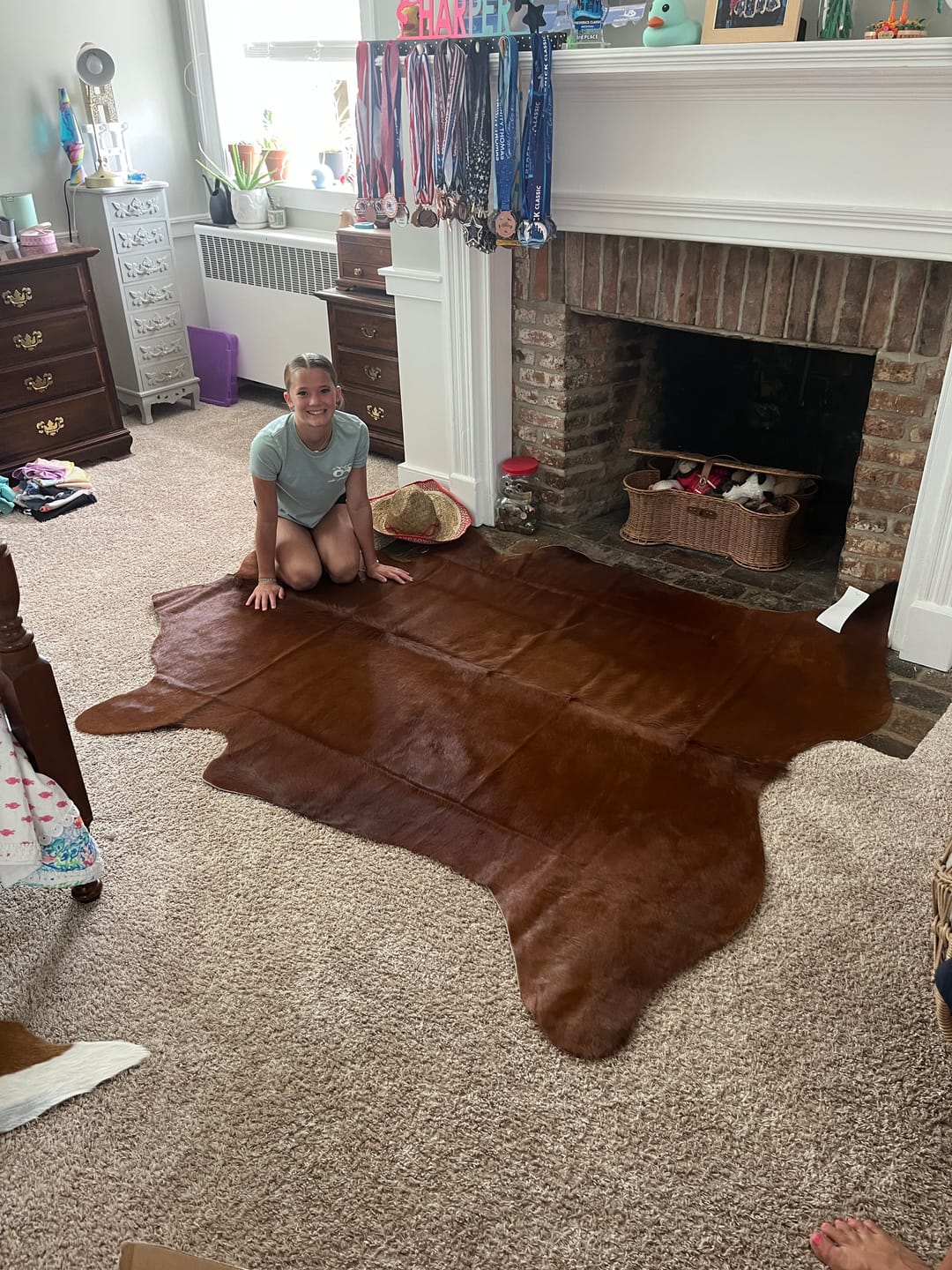 Customer photo review of SUPER SALE Brown Natural Cowhide Rug - Large 6' 9"H x 6' 0"W