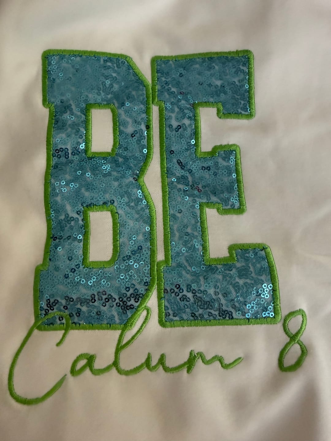 Customer photo review of Custom Sequin Name or Team Sweatshirt – Personalized Glitter Letters, Vintage Wash Style | Gifts for Sports Mom