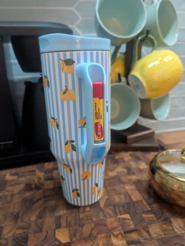 Customer's Thicc Buddy 40oz mug featuring blue striped pattern with lemons and a chapstick in the handle.