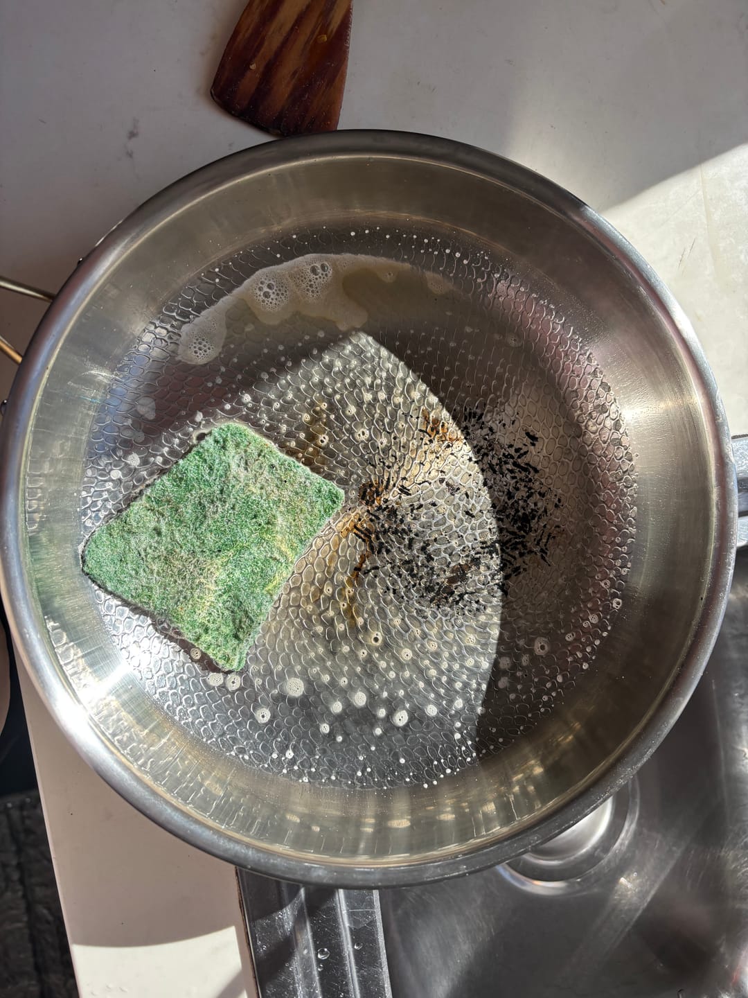 Customer photo review of Hand-Hammered Titanium Wok Pan with Flat Base