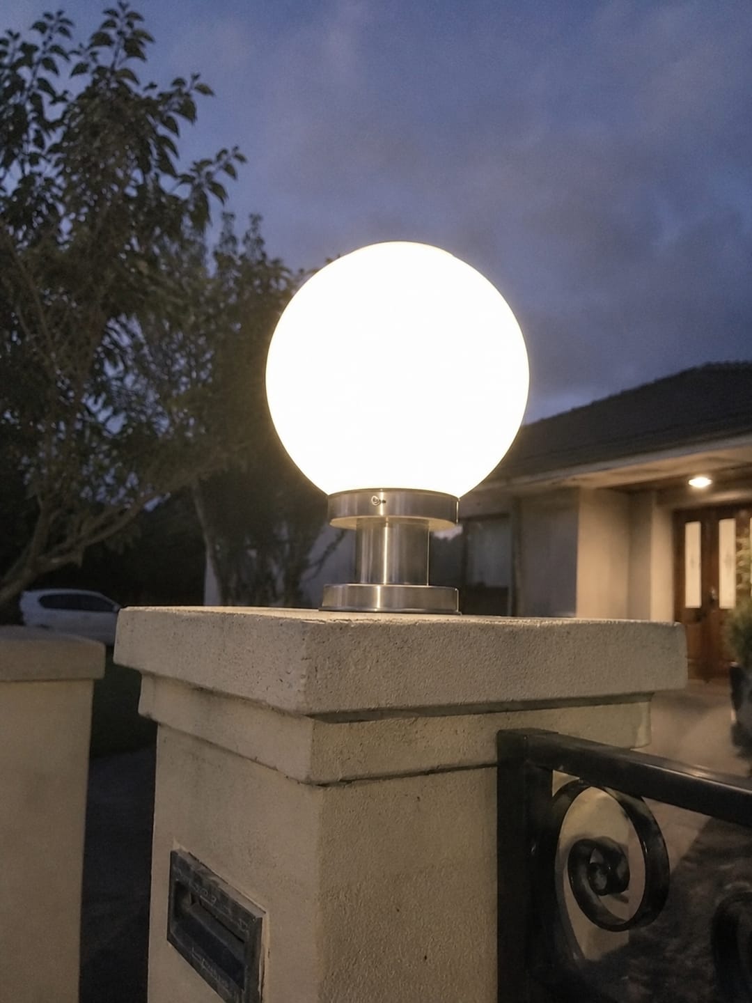 Customer photo review of 30cm Solar Globe Pillar Light –  Dusk to Dawn Outdoor Large Pillar Lamp
