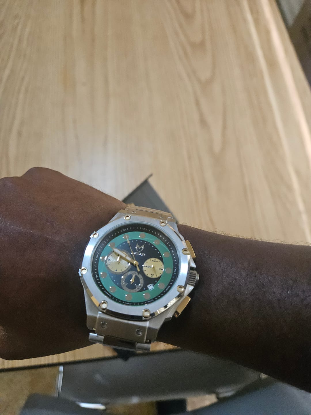 Customer photo review of AM1055LB - AMBASSADOR SILVER / DOOM GREEN LEATHER BAND WATCH