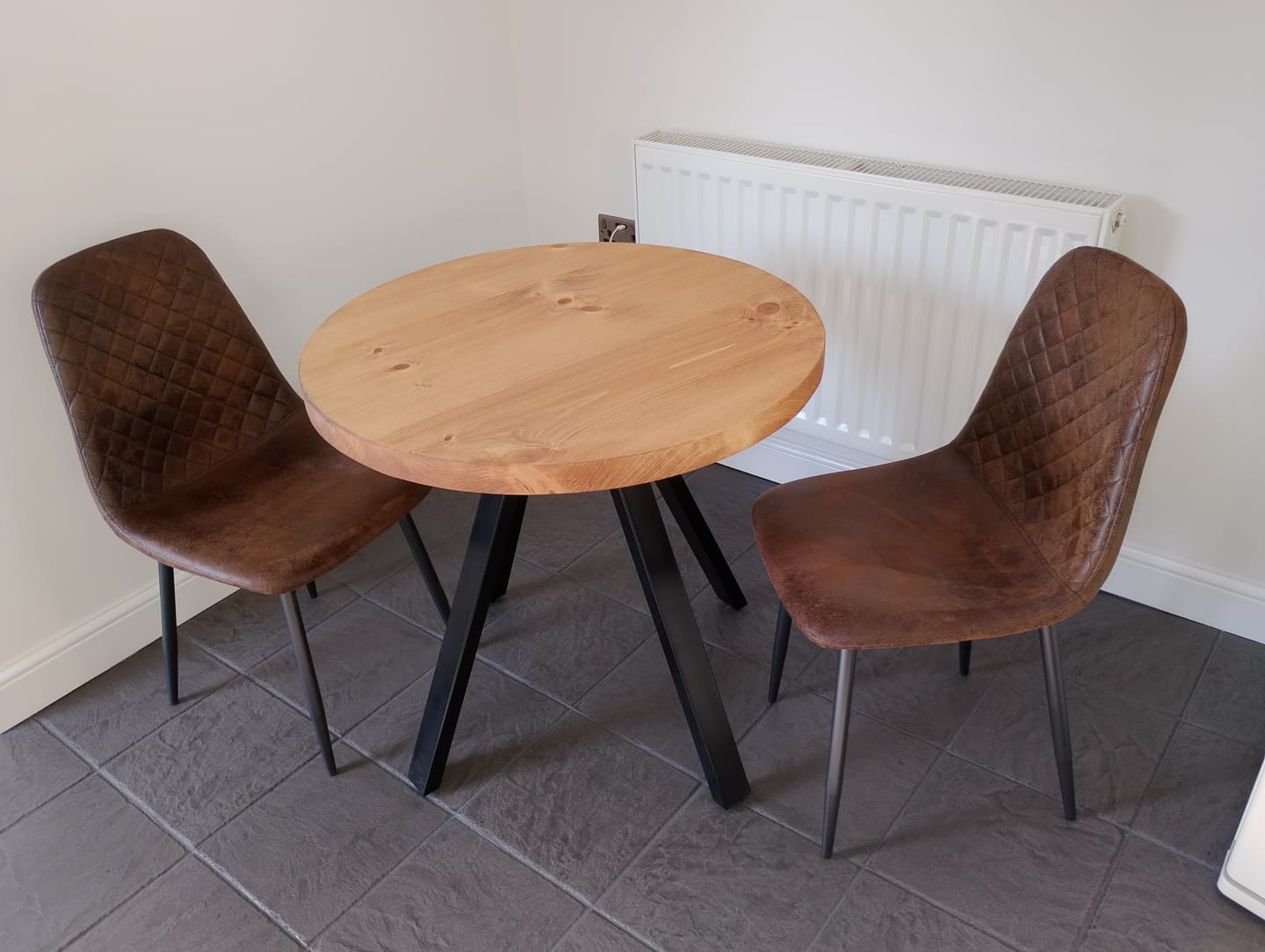 Customer photo review of Round Dining Table