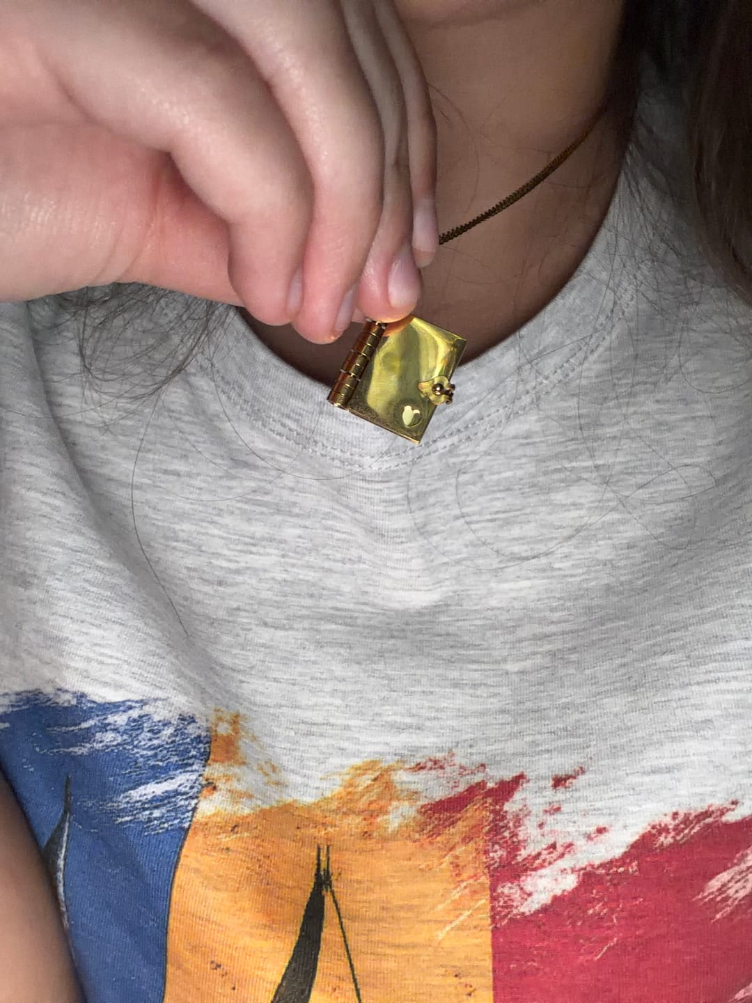 Customer photo review of Personalized Book Locket Necklace