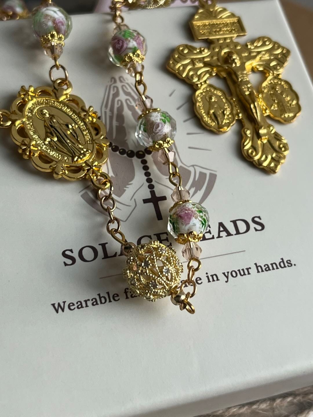 Customer photo review of SolaceBeads White Floral Lampwork Glass Rosary: Grace With Gold Filigree & Miraculous Medal