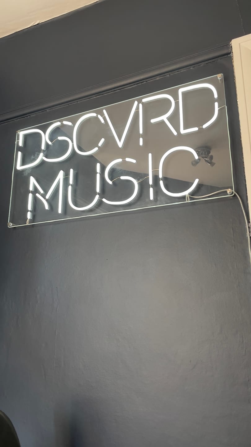 Customer photo review of Custom Sign: DSCVRD MUSIC