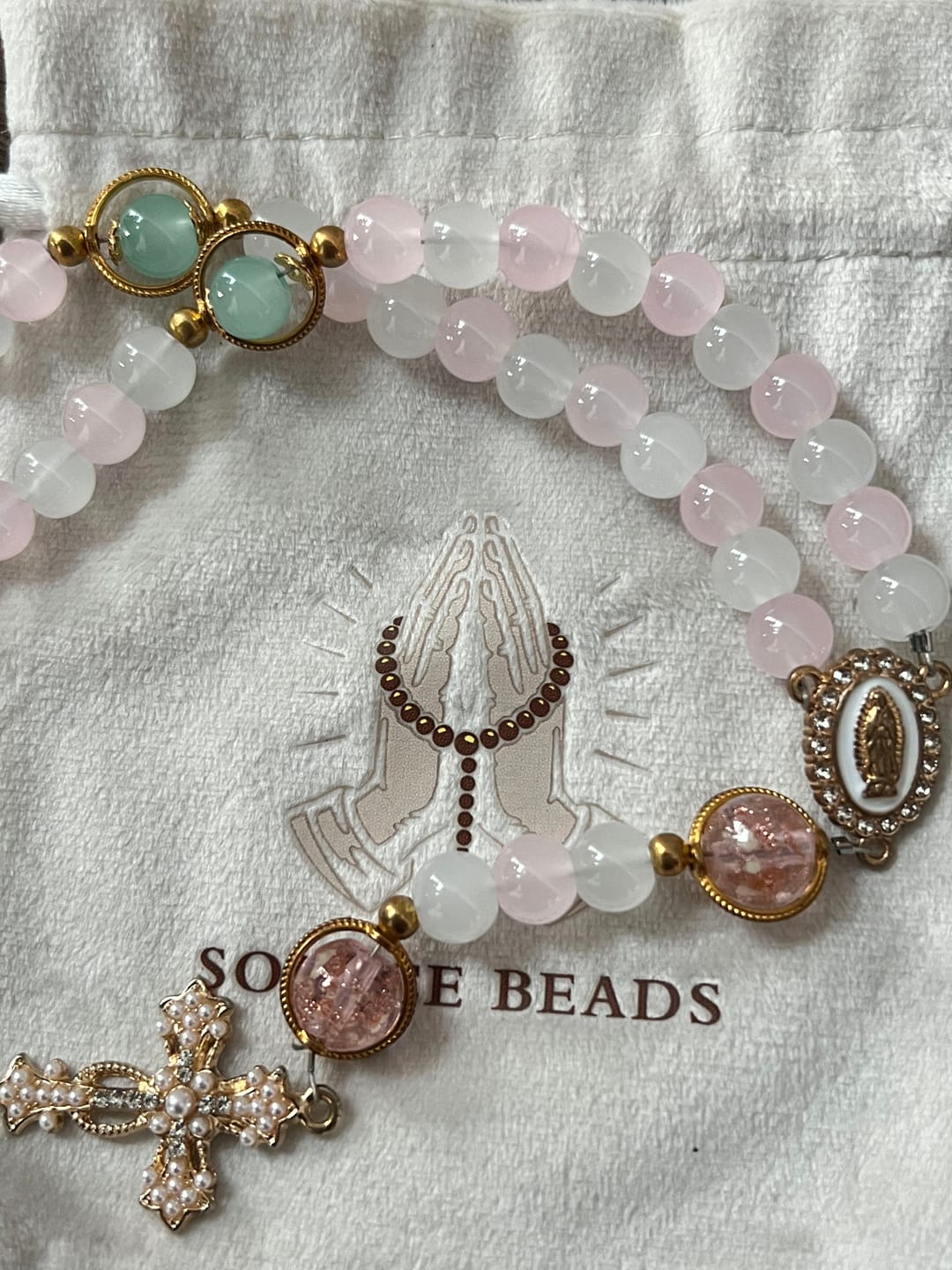 Customer photo review of SolaceBeads Artistic Pink & White Beaded Rosary: A Fusion of Colors & Sacred Symbols