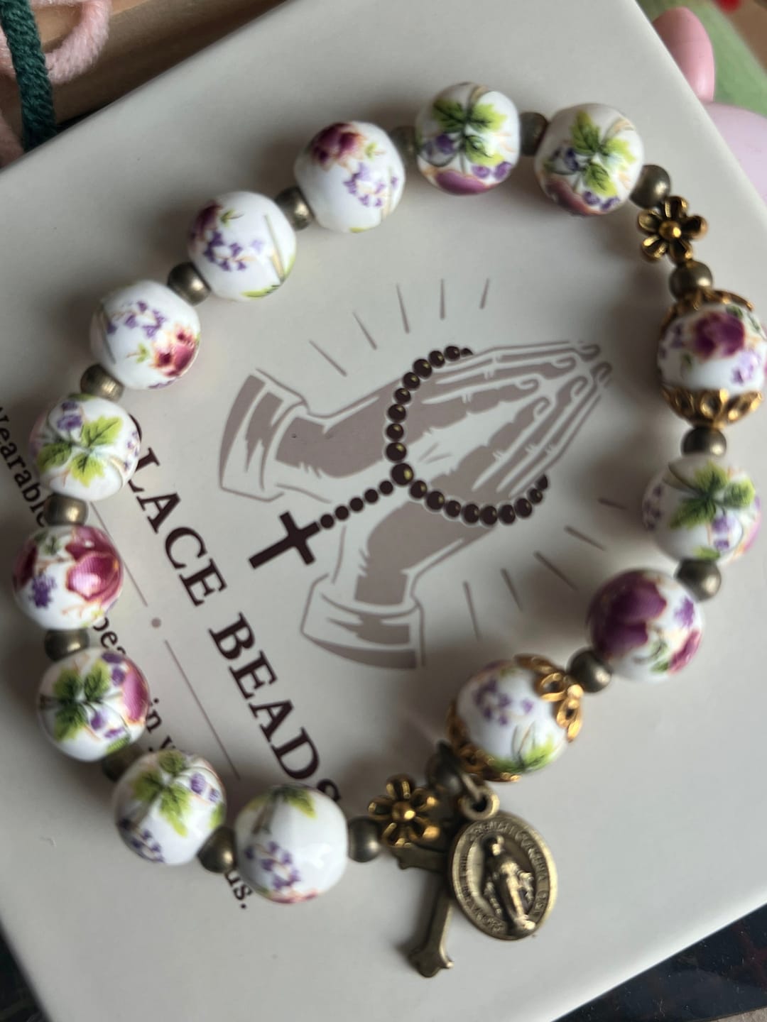 Customer photo review of SolaceBeads Peacock Blue & Champagne Crystal Rosary: A Prismatic Glow of Sacred Light