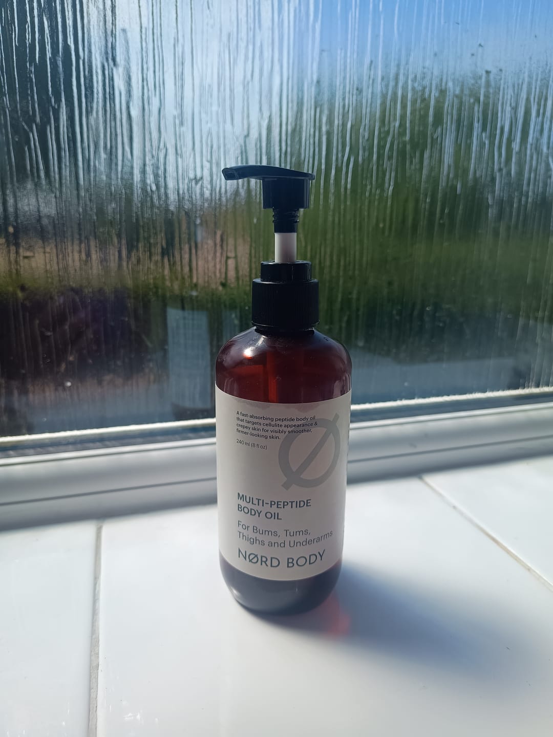 Customer photo review of NØRD BODY Peptide Body Oil