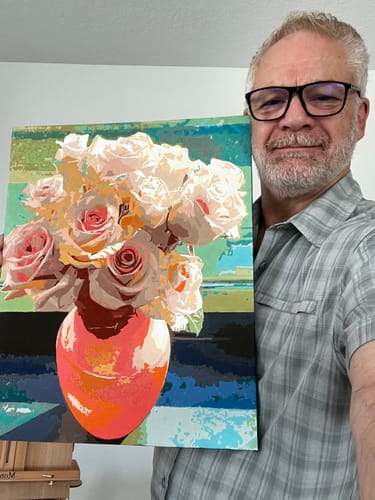 Customer's completed Custom Paint by Numbers Kit painting of pink roses in a vase held by a person.