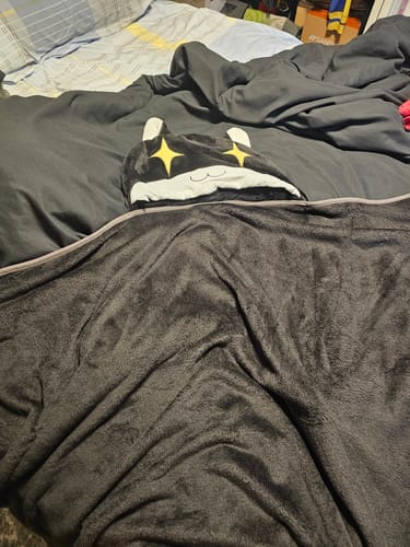 Customer's Persona 5 Leisure Blanket, soft and black, spread over a bed with a character-themed hood.