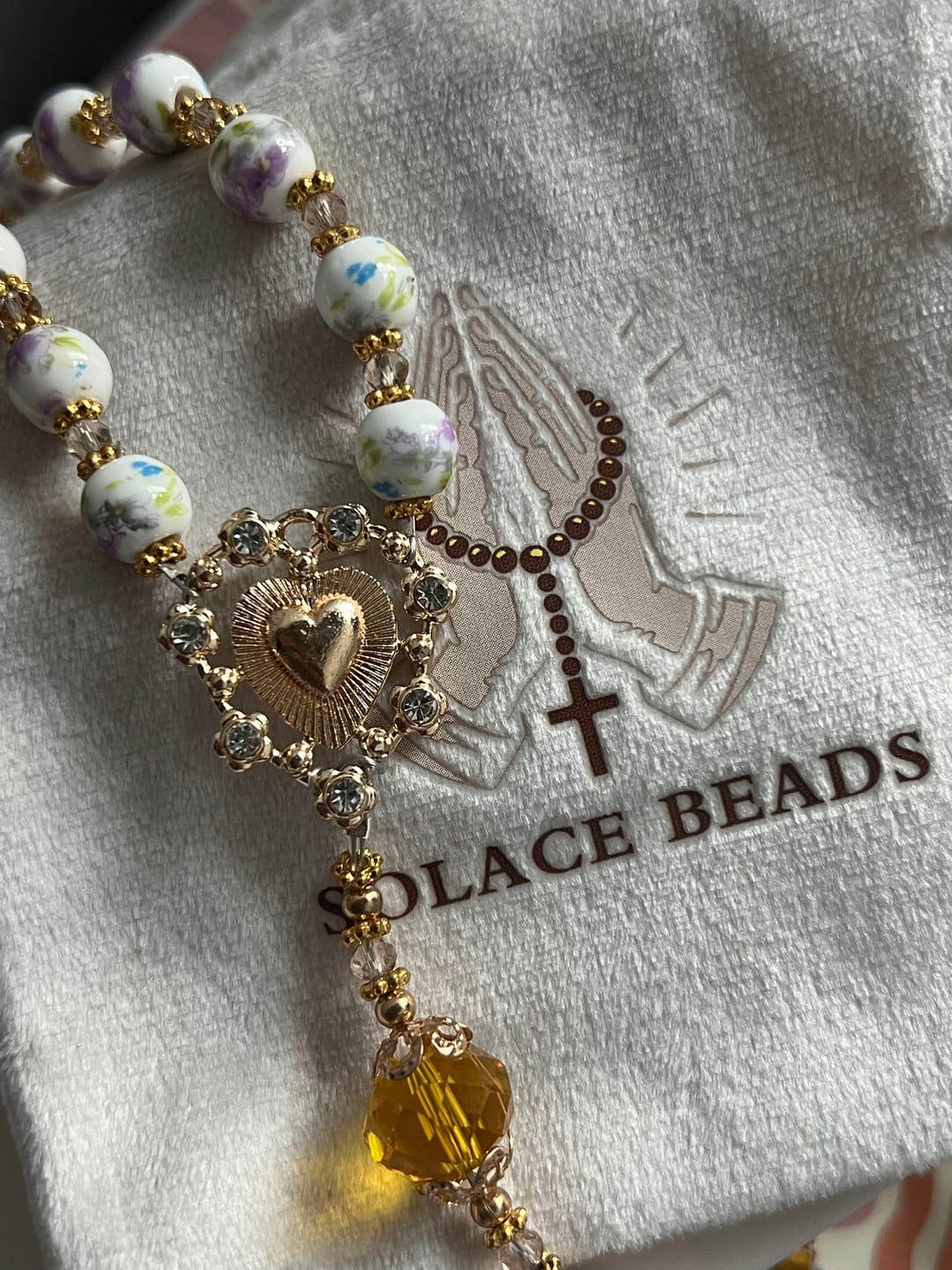 Customer photo review of SolaceBeads Lavender Floral With Golden Sacred Heart & Crucifix Rosary: Faith in Every Bead