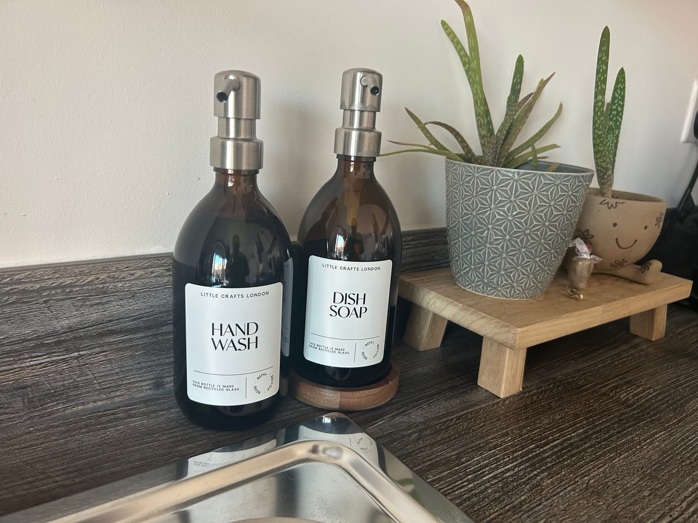 Customer photo review of 500ml Amber Glass Bottle with Metal Pump White Label