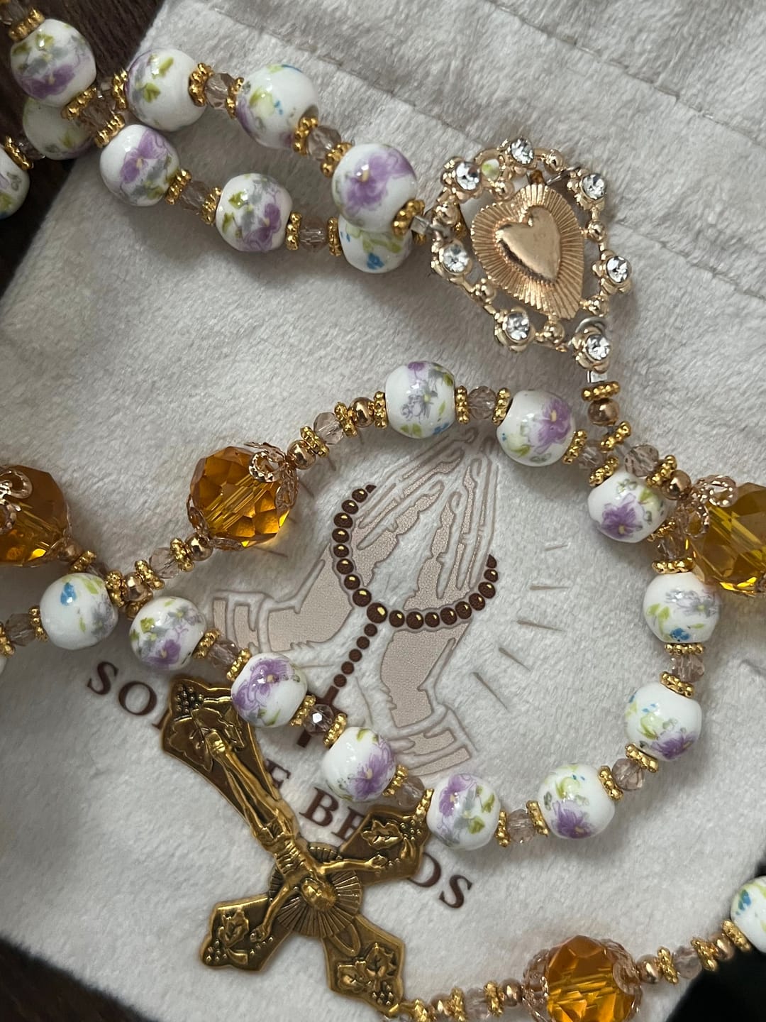 Customer photo review of SolaceBeads Lavender Floral With Golden Sacred Heart & Crucifix Rosary: Faith in Every Bead