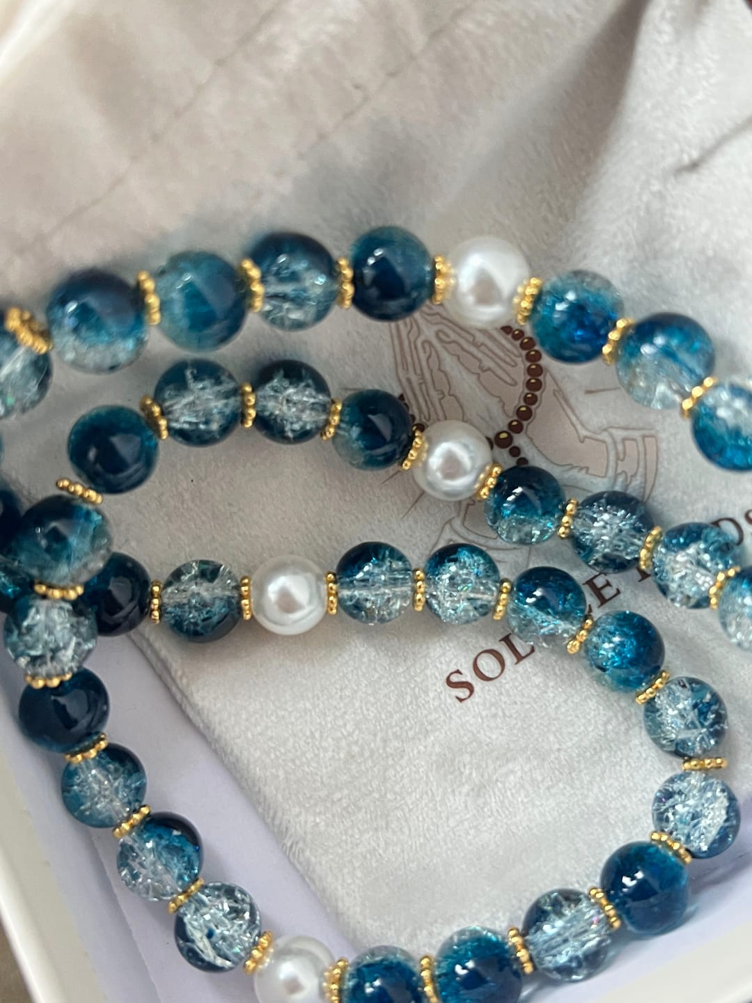 Customer photo review of SolaceBeads Gradient Ocean Crackle Glass Rosary & Pearl Embedded Cross: Rooted in Guadalupe Faith