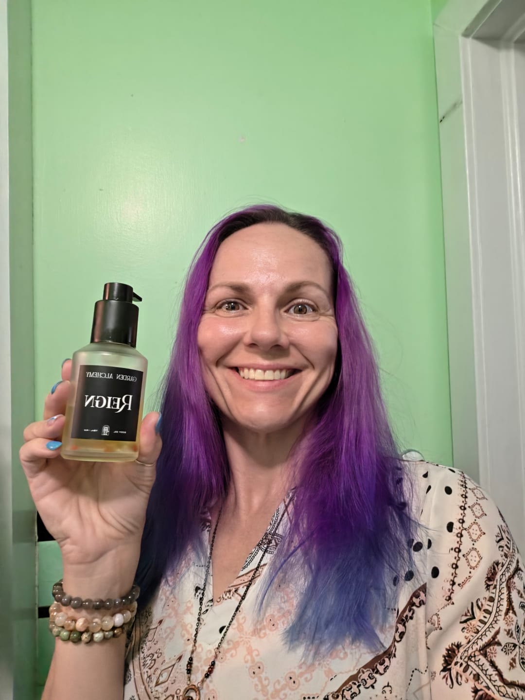 Customer photo review of REIGN BODY OIL