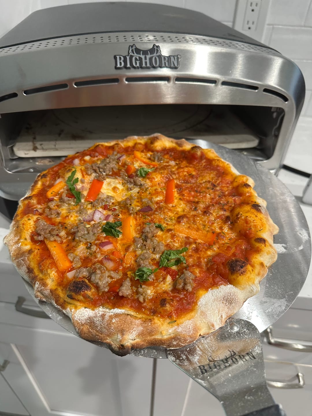 Customer photo review of 14" Indoor Electric Countertop Pizza Oven with 6 Preset Modes, Stainless Steel