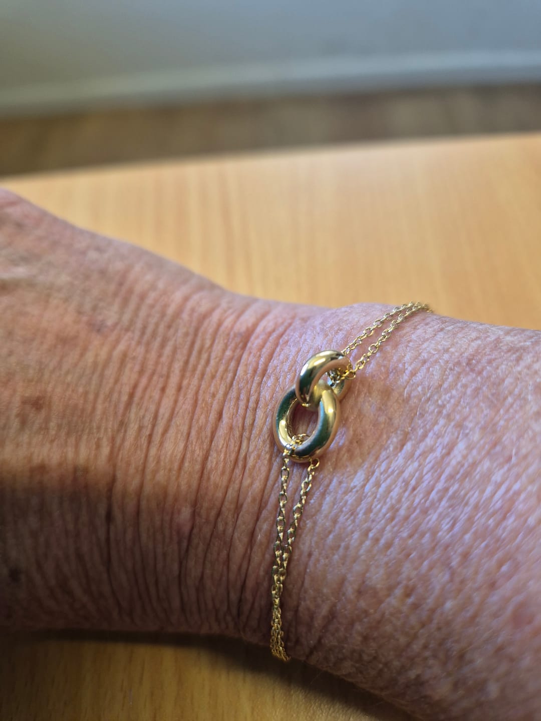 Customer photo review of Gold Unity Ring Bracelet